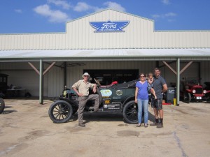 family Ross in front of garage