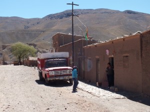 car in village