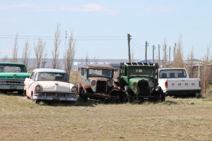 A Ford cars and other oldtimers along the road